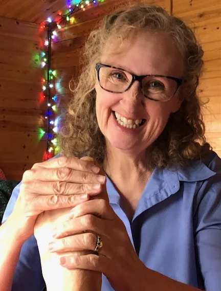 Headshot of Karen West, reflexology practitioner